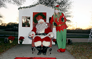 Santa and Elf Lydia Eaker await anxious kids. 
