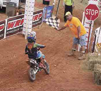 Andrew Segars prepares for the PeeWee race.