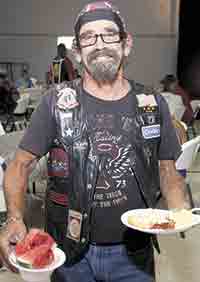 Michael "Cowboy" VanValen is pictured in line for some grub.