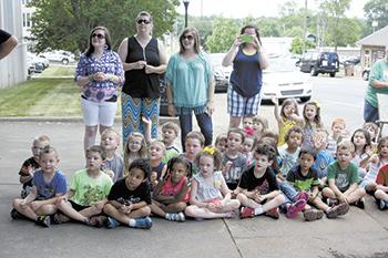 Preschoolers wait for the Clydesdales!